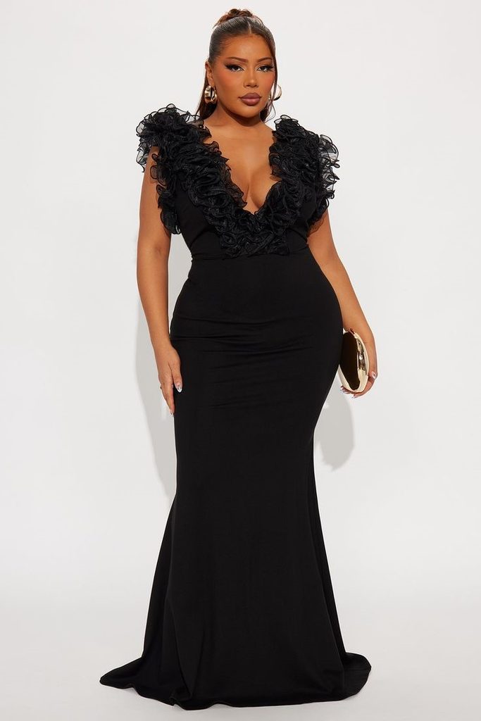 Birthday Dinner Outfit Ideas for Plus Size Women featuring a glamorous black maxi dress with a dramatic ruffled neckline