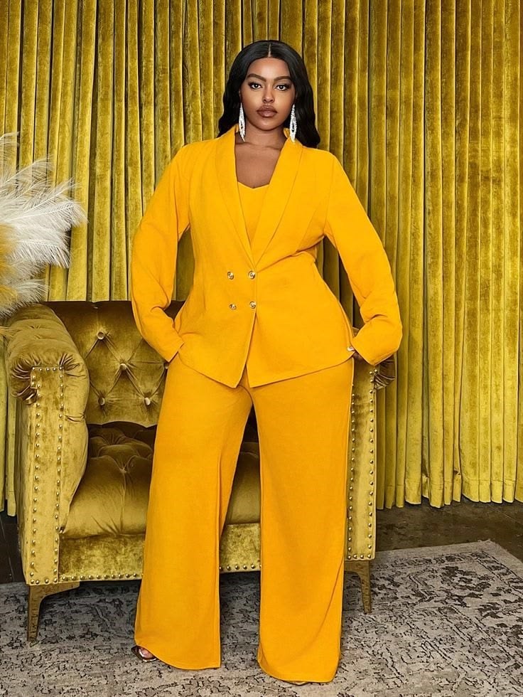 Birthday Dinner Outfit Ideas for Plus Size Women featuring a mustard-yellow monochrome trouser suit with wide-leg trousers