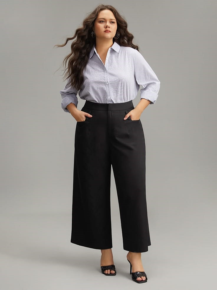 Business casual outfits for plus size women featuring cropped tailored trousers and a tucked-in button-down shirt.
