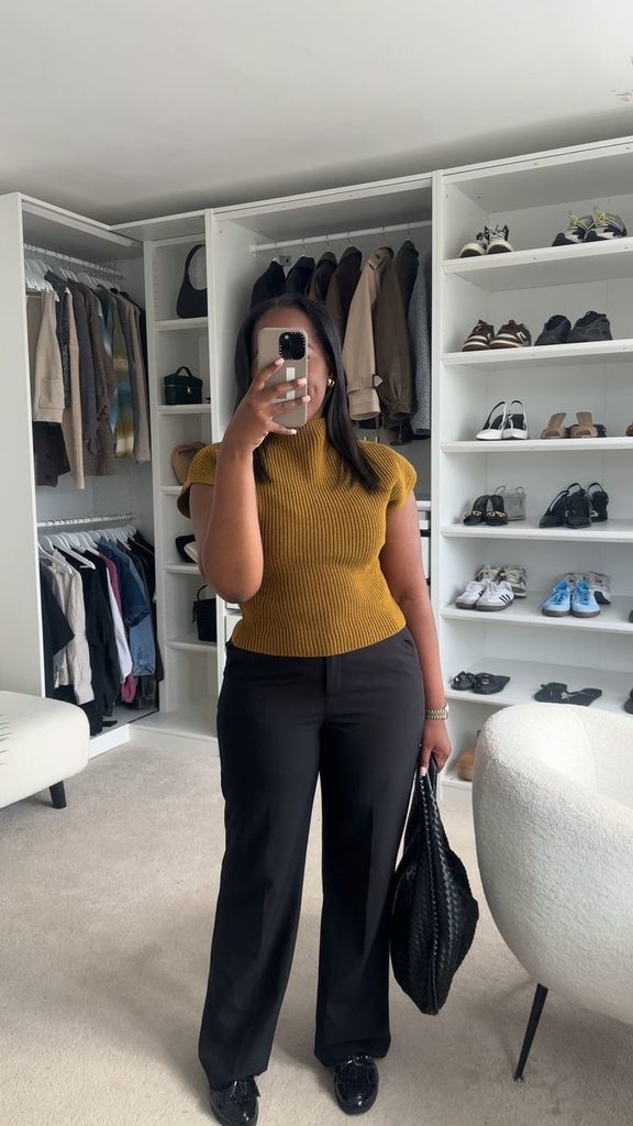 Business casual outfits for plus size women featuring a fine-knit top and straight-leg tailored trousers.