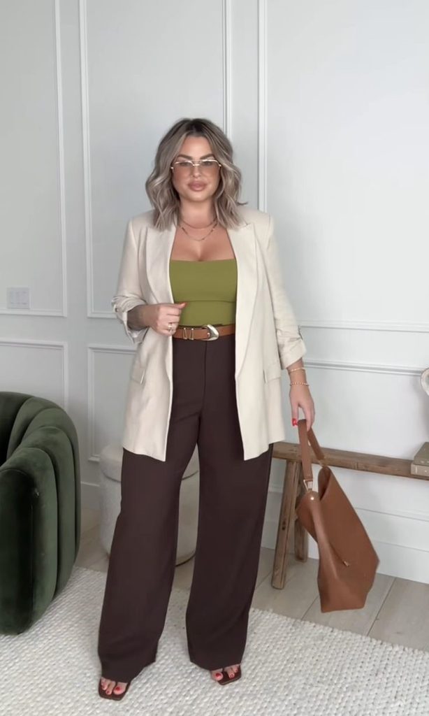 Business casual outfits for plus size women featuring a neutral blazer paired with a colorful top and tailored trousers.