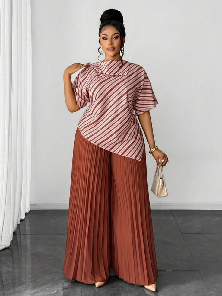 Business casual outfits for plus size women featuring pleated tailored trousers and a sleeveless blouse.