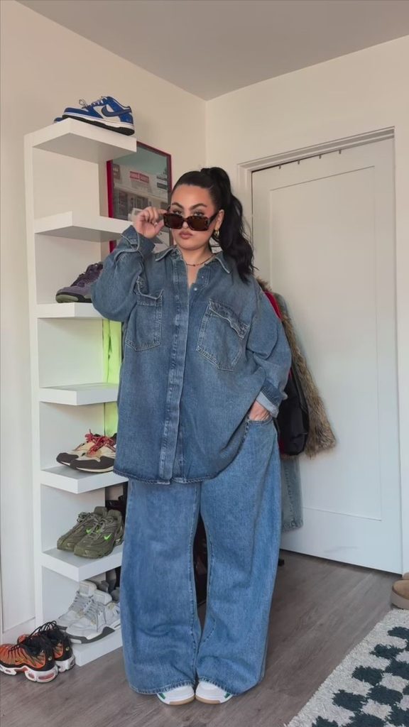 Plus size denim jacket outfit with an oversized denim jacket and matching wide-leg jeans.