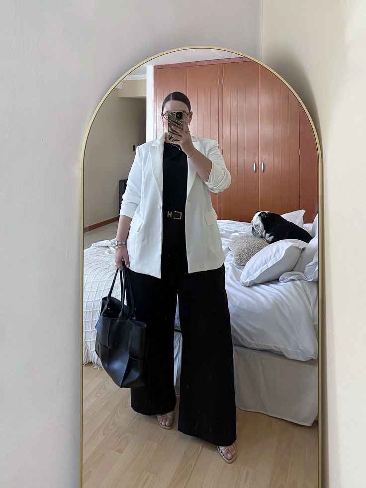 Neutral Outfit Ideas featuring a white blazer, black top, black wide-leg trousers, and a black tote bag.
