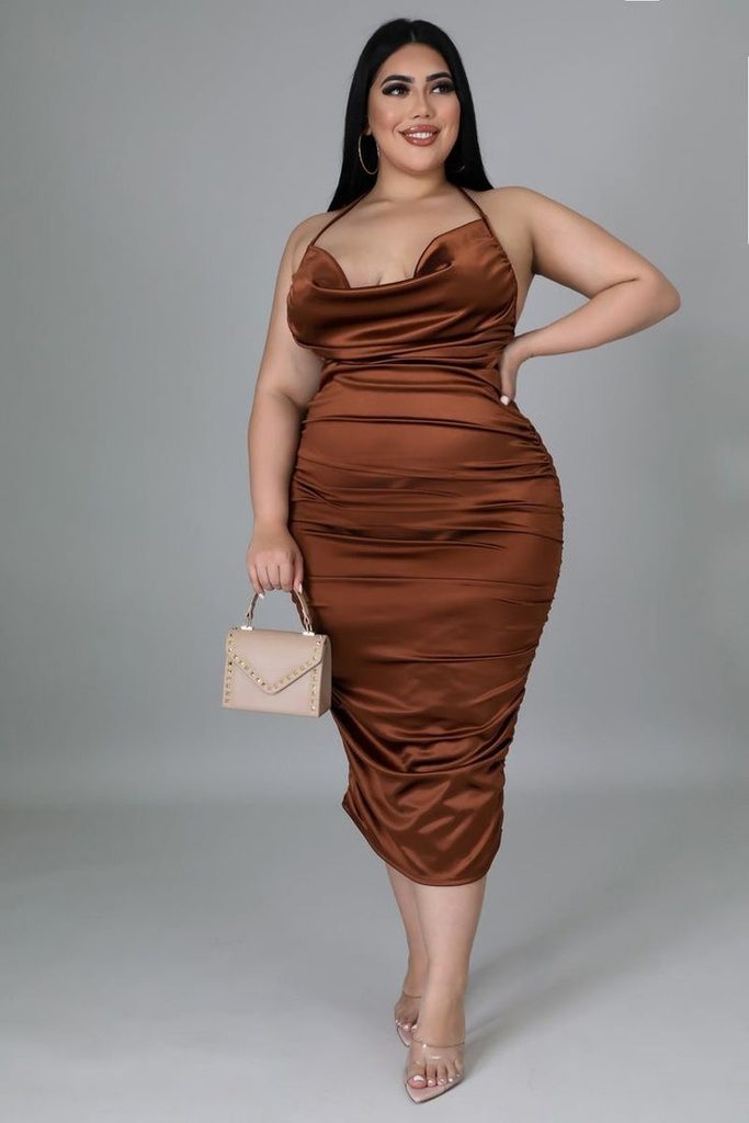 Plus size birthday dinner outfit featuring a brown satin midi dress with a cowl neckline and ruched details
