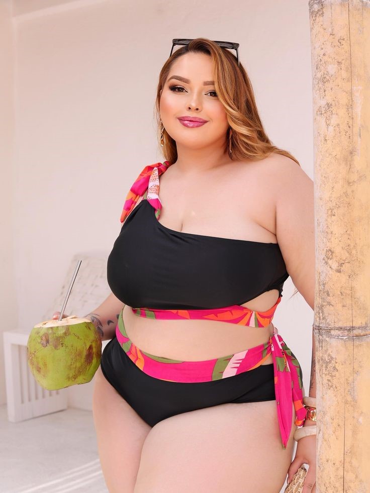 Plus size swimsuits featuring a black one-piece with colorful straps and side cutouts