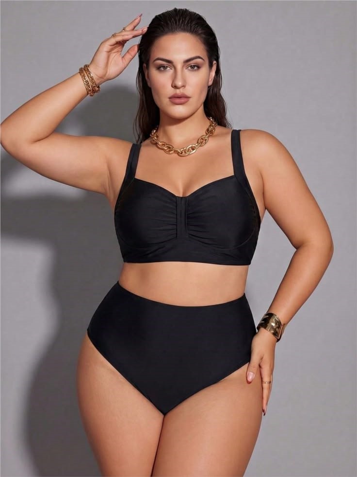 The Most Flattering High-Waisted Swimwear with a black ruched bikini top and high-waisted bottoms