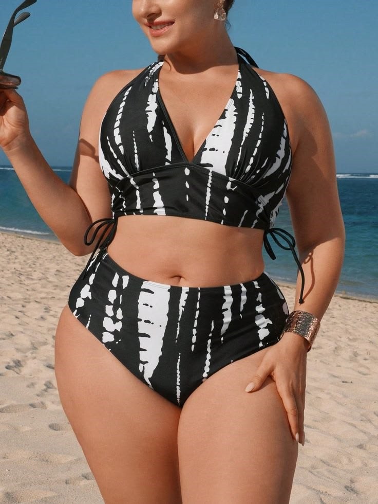 The Most Flattering High-Waisted Swimwear with a high-leg black and white printed bikini