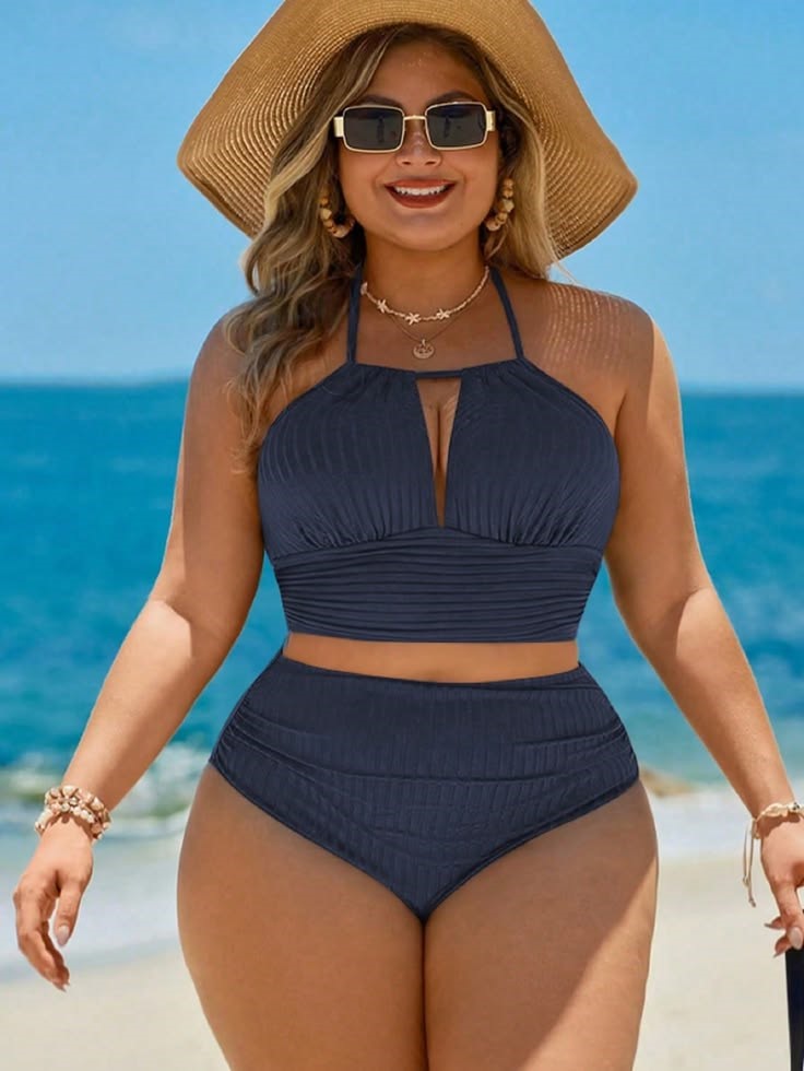 The Most Flattering High-Waisted Swimwear with a wide waistband and textured fabric