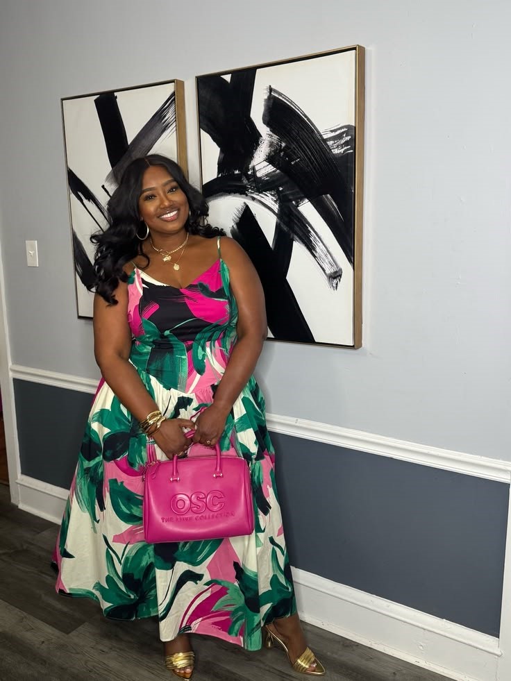 Stylish plus size woman wearing a bold printed dress while embracing personal style.